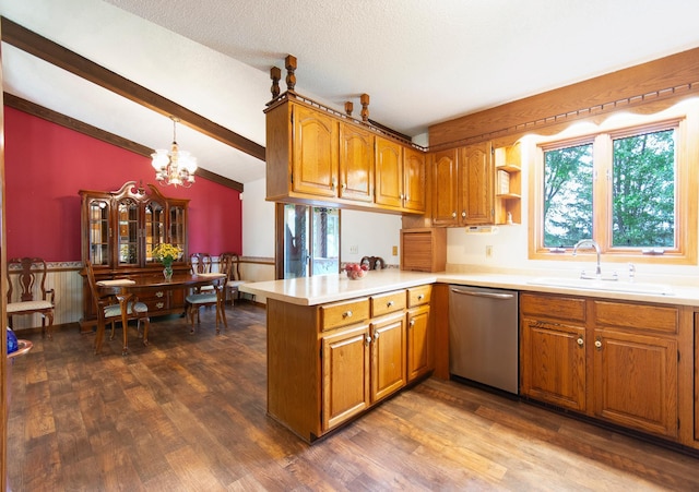 kitchen featuring brown cabinets, vaulted ceiling with beams, a sink, dishwasher, and a peninsula