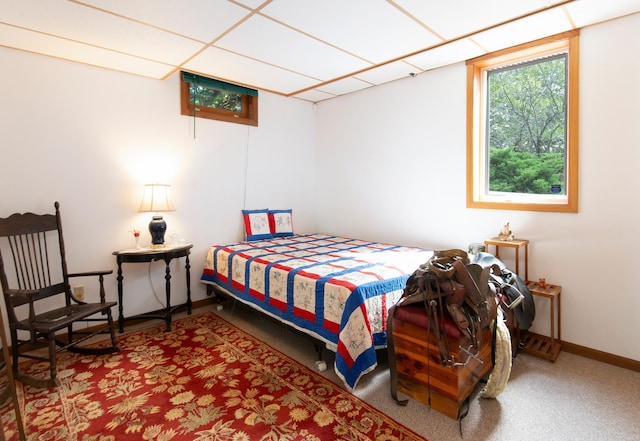 bedroom with carpet and baseboards