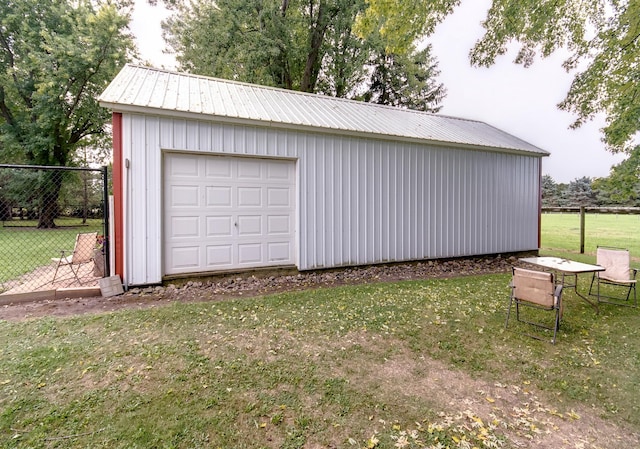 garage with fence