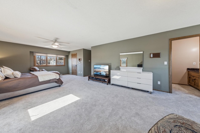 carpeted bedroom with a ceiling fan