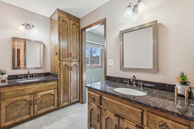 bathroom with two vanities and a sink