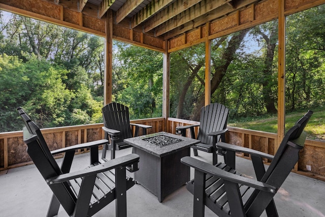 view of patio with an outdoor fire pit