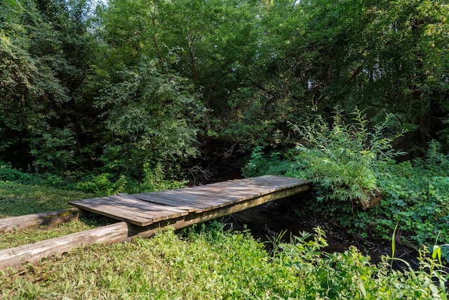 exterior space featuring a view of trees