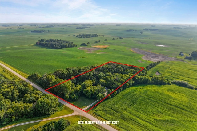 birds eye view of property featuring a rural view