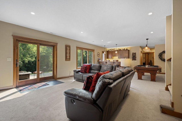 living room featuring recessed lighting, billiards, baseboards, and light colored carpet