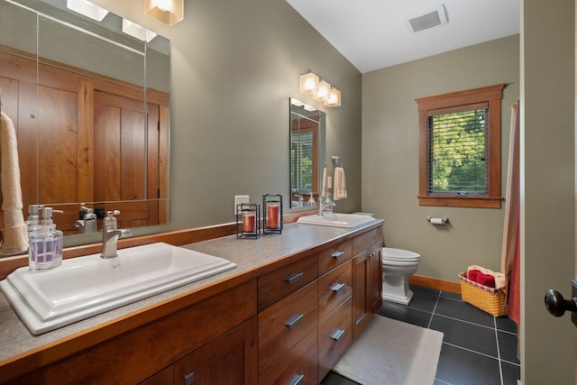 full bathroom with visible vents, a sink, toilet, and tile patterned floors