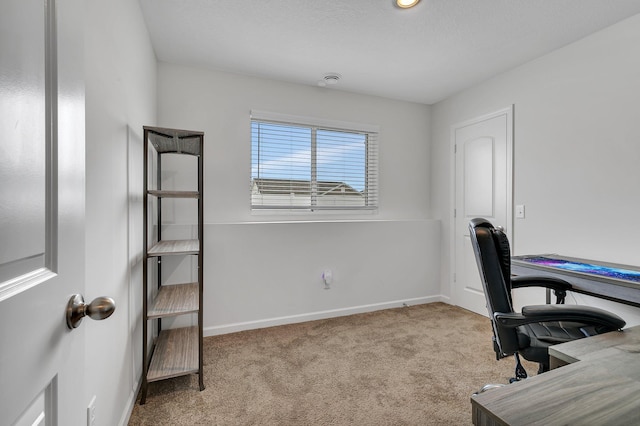 office space featuring carpet flooring and baseboards