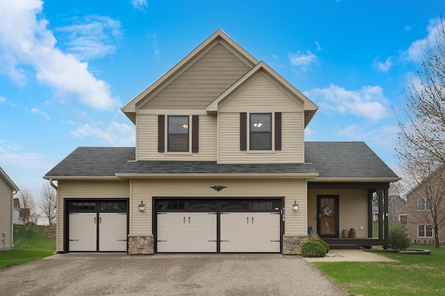 5108 Harvest Curv, Mayer, MN 55360 - view of front of home with a garage, stone siding, a porch, and aphalt driveway