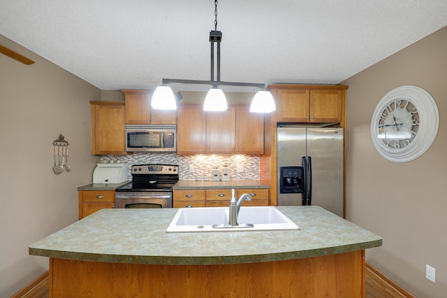5108 Harvest Curv, Mayer, MN 55360 - kitchen with decorative backsplash, appliances with stainless steel finishes, wood finished floors, a sink, and baseboards