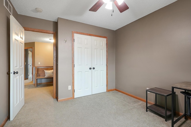5108 Harvest Curv, Mayer, MN 55360 - bedroom featuring a textured ceiling, visible vents, baseboards, a closet, and light carpet