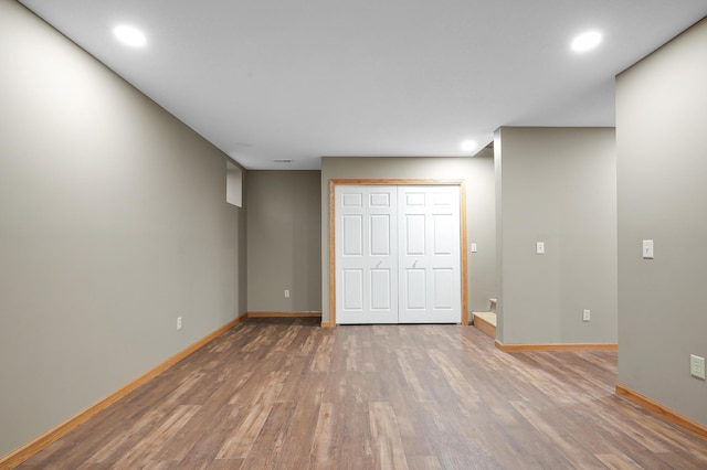 5108 Harvest Curv, Mayer, MN 55360 - unfurnished bedroom with baseboards, a closet, recessed lighting, and wood finished floors