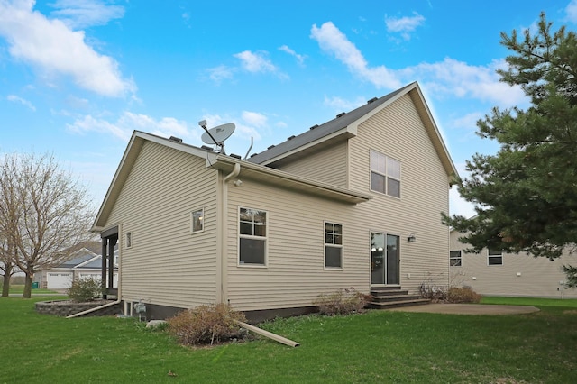 5108 Harvest Curv, Mayer, MN 55360 - back of house featuring a lawn and entry steps
