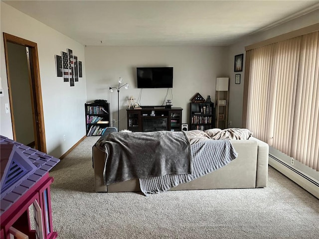 living room featuring carpet, a baseboard radiator, and baseboards