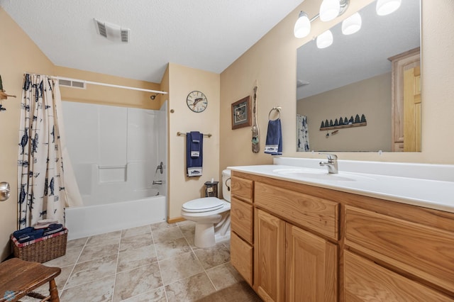 bathroom featuring shower / bath combo, visible vents, toilet, a textured ceiling, and vanity