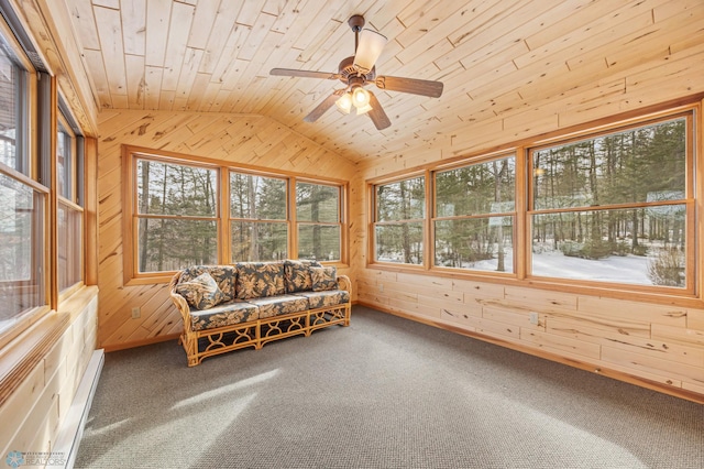 unfurnished sunroom with a ceiling fan, lofted ceiling, and wooden ceiling