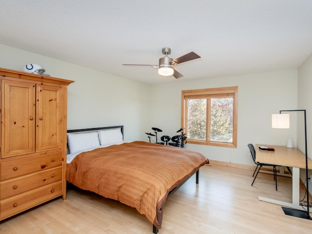 bedroom featuring ceiling fan and light wood-style floors