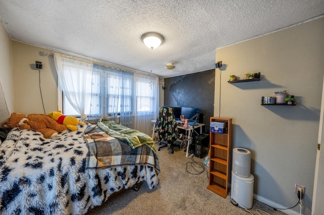 carpeted bedroom with a textured ceiling