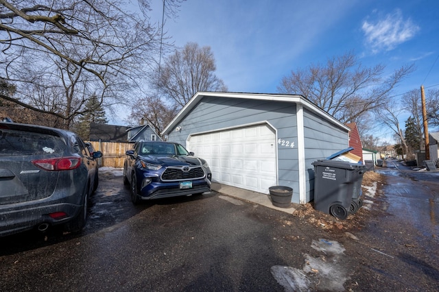 detached garage with fence