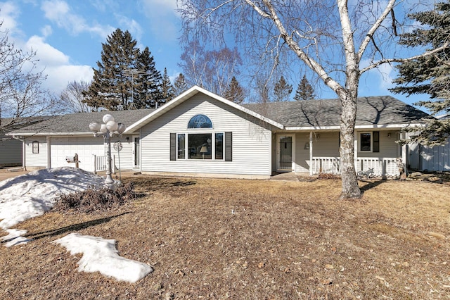 single story home featuring covered porch, roof with shingles, and an attached garage