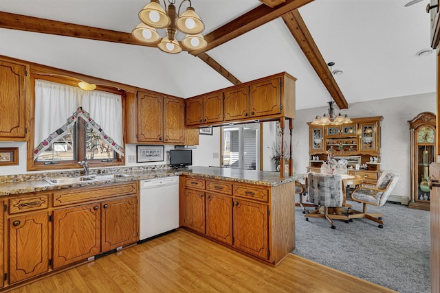 kitchen with a sink, lofted ceiling with beams, brown cabinetry, and dishwasher