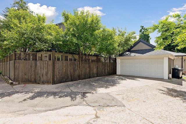 garage featuring fence