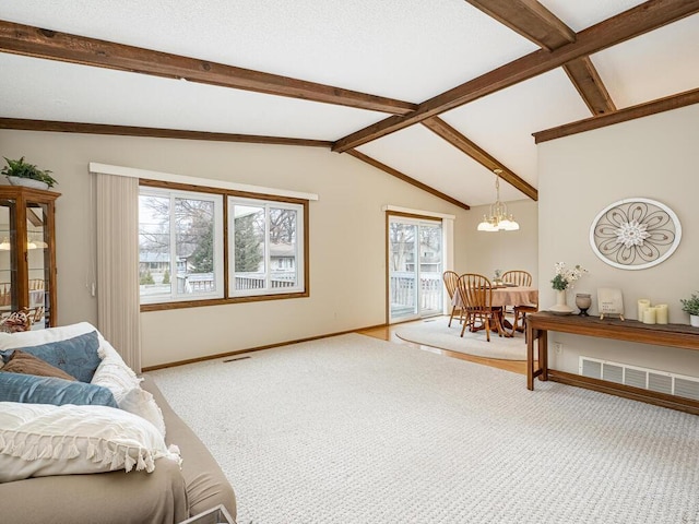 living room featuring a notable chandelier, lofted ceiling with beams, visible vents, and light colored carpet