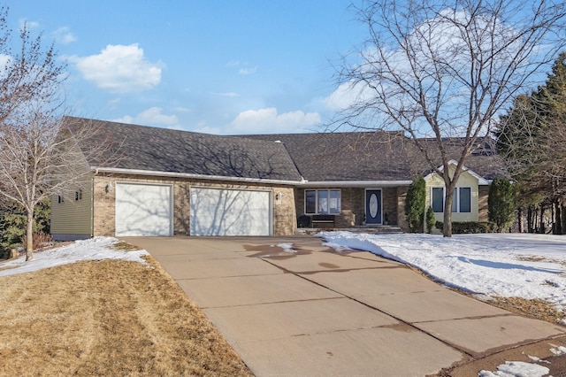 ranch-style house featuring brick siding, an attached garage, concrete driveway, and a shingled roof