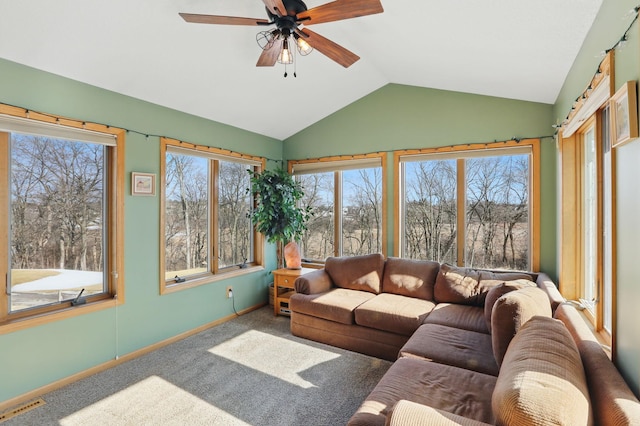 sunroom with visible vents, a ceiling fan, and lofted ceiling