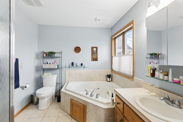 bathroom with visible vents, toilet, tile patterned floors, a tub with jets, and vanity