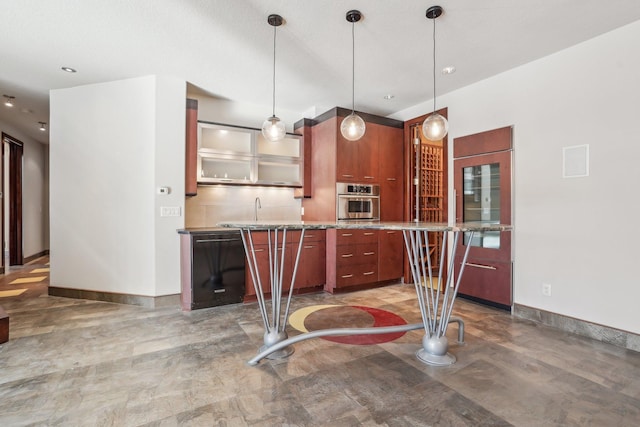 kitchen featuring black dishwasher, hanging light fixtures, decorative backsplash, glass insert cabinets, and stainless steel oven