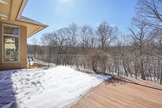 view of snow covered deck