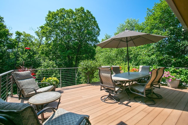9730 Sky Ln, Eden Prairie, MN 55347 - wooden deck with outdoor dining area