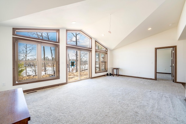 unfurnished living room featuring carpet, baseboards, visible vents, high vaulted ceiling, and recessed lighting