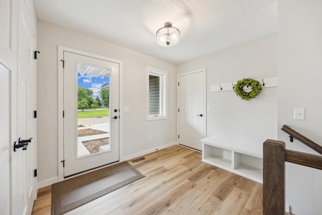 4695 3rd Street Loop NE, Saint Cloud, MN 56304 - entrance foyer featuring light wood-style flooring and baseboards