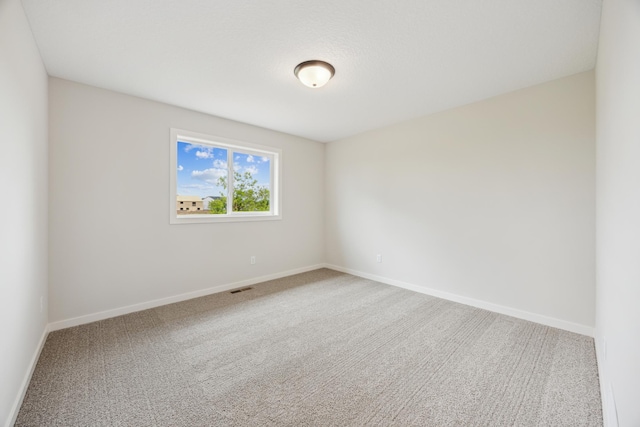 4695 3rd Street Loop NE, Saint Cloud, MN 56304 - carpeted empty room featuring baseboards