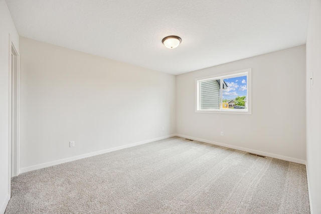 4695 3rd Street Loop NE, Saint Cloud, MN 56304 - unfurnished room featuring light carpet and baseboards