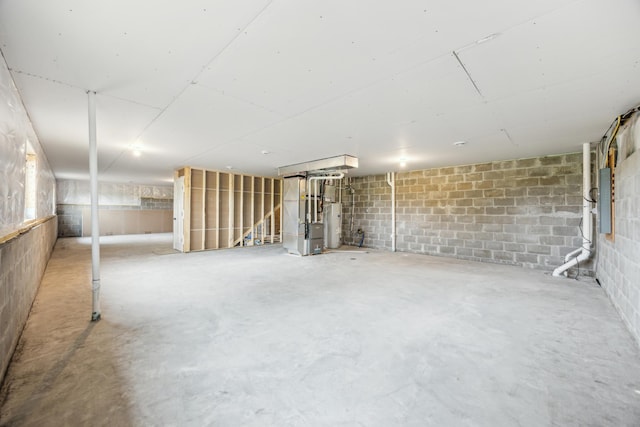 4695 3rd Street Loop NE, Saint Cloud, MN 56304 - unfinished below grade area with concrete block wall, electric panel, and heating unit