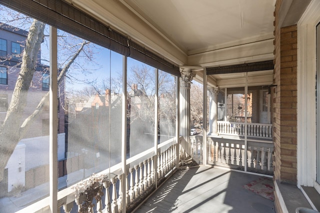 unfurnished sunroom with a wealth of natural light