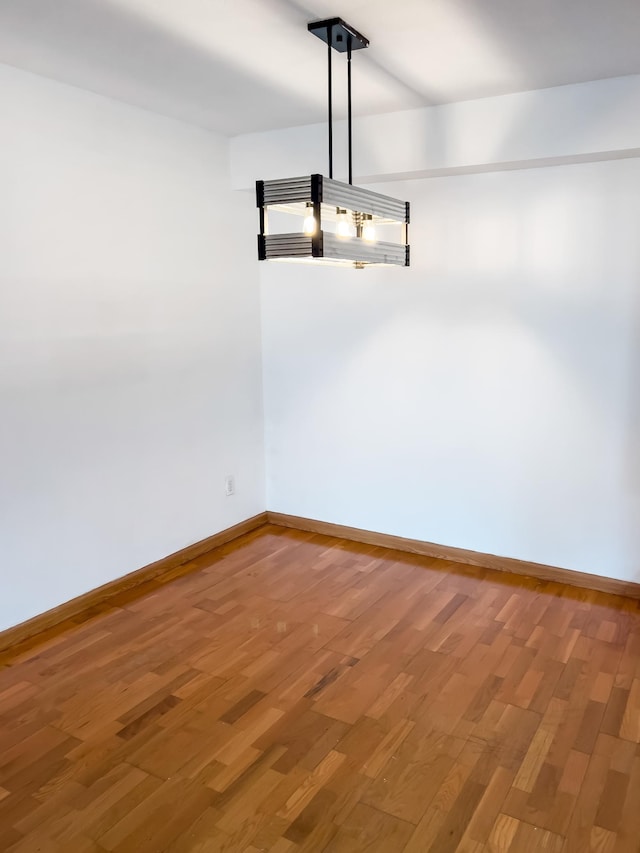 5440 Three Points Blvd Unit 513, Mound, MN 55364 - empty room with baseboards and light wood finished floors