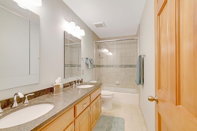 full bathroom featuring tile patterned flooring, visible vents, a sink, and toilet