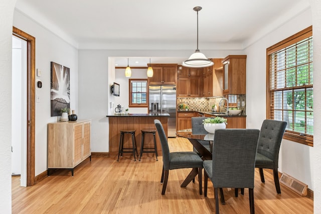 5824 10th Ave S, Minneapolis, MN 55417 - dining room featuring light wood finished floors and baseboards
