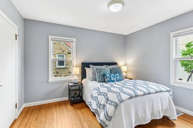 5824 10th Ave S, Minneapolis, MN 55417 - bedroom featuring light wood-type flooring and baseboards
