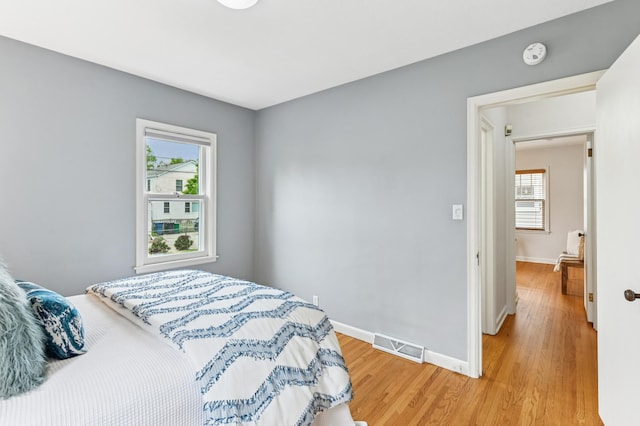 5824 10th Ave S, Minneapolis, MN 55417 - bedroom featuring baseboards and light wood-type flooring