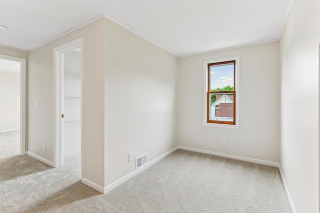 5824 10th Ave S, Minneapolis, MN 55417 - unfurnished room featuring carpet floors and baseboards