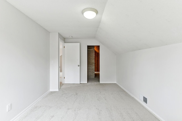 5824 10th Ave S, Minneapolis, MN 55417 - bonus room featuring carpet floors, vaulted ceiling, and baseboards