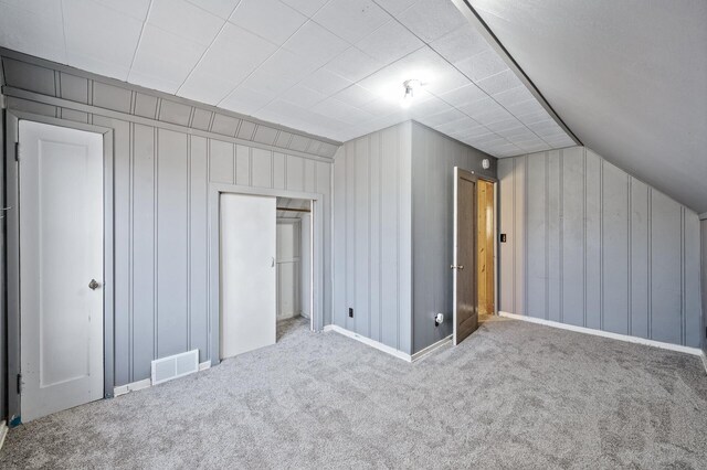 1610 Hennepin Ave N, Glencoe, MN 55336 - bonus room featuring baseboards, vaulted ceiling, visible vents, and carpet floors