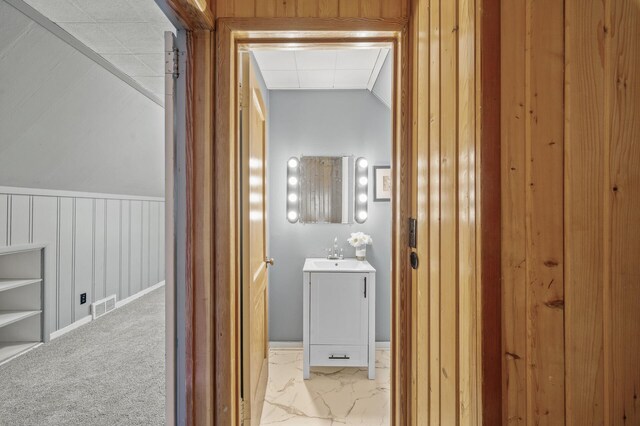1610 Hennepin Ave N, Glencoe, MN 55336 - hallway featuring wainscoting, visible vents, a sink, and marble finish floor
