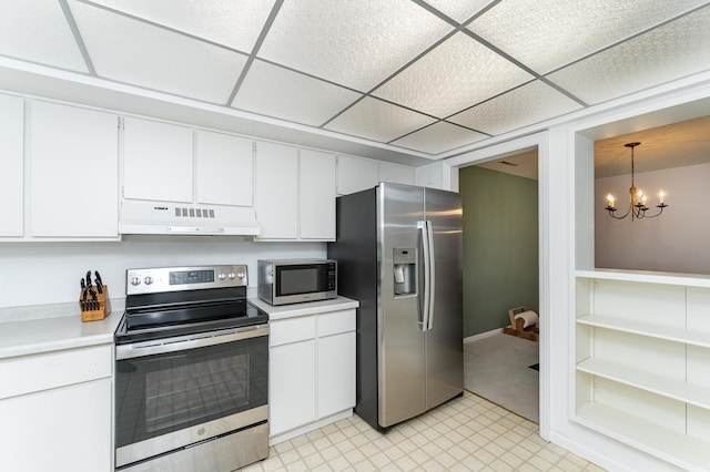 2053 Carriage Dr SW Unit 2053E, Rochester, MN 55902 - kitchen with appliances with stainless steel finishes, under cabinet range hood, light countertops, light floors, and white cabinetry