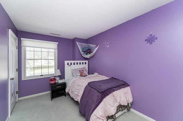 2053 Carriage Dr SW Unit 2053E, Rochester, MN 55902 - carpeted bedroom featuring baseboards