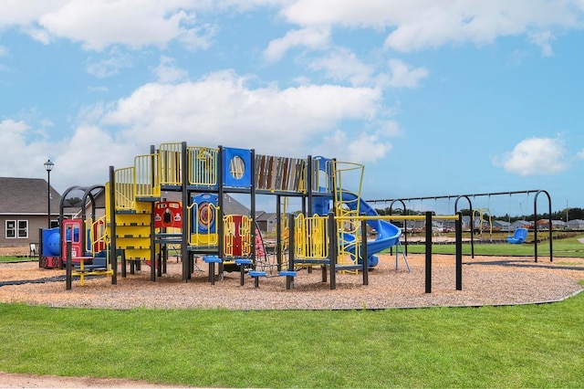 community play area with a yard